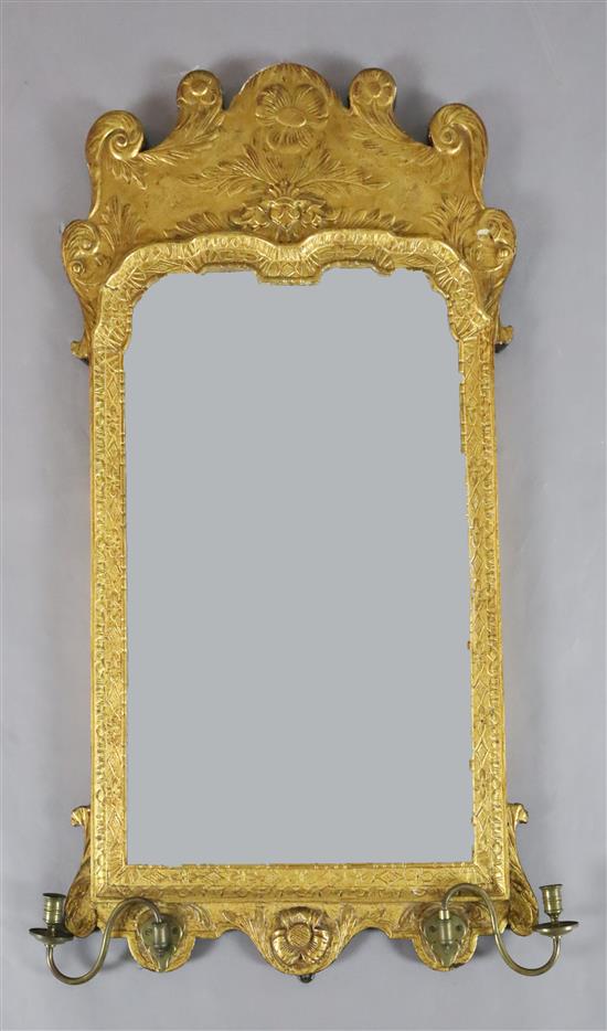A George II giltwood and gesso wall mirror, W.1ft 10in. H.3ft 3in.